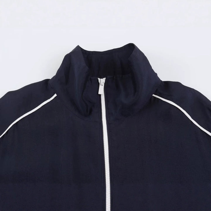 Damen Kurz geschnittene Windjacke mit hohem Kragen und elastischem Saum Drune