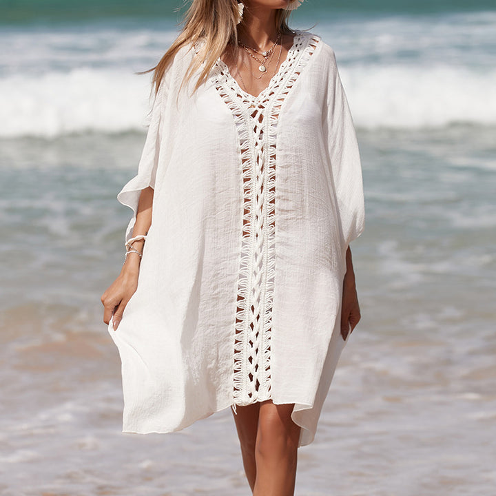 Damen eleganter Strandponcho mit raffinierten Häkelakzenten und tiefem V-Ausschnitt Drune