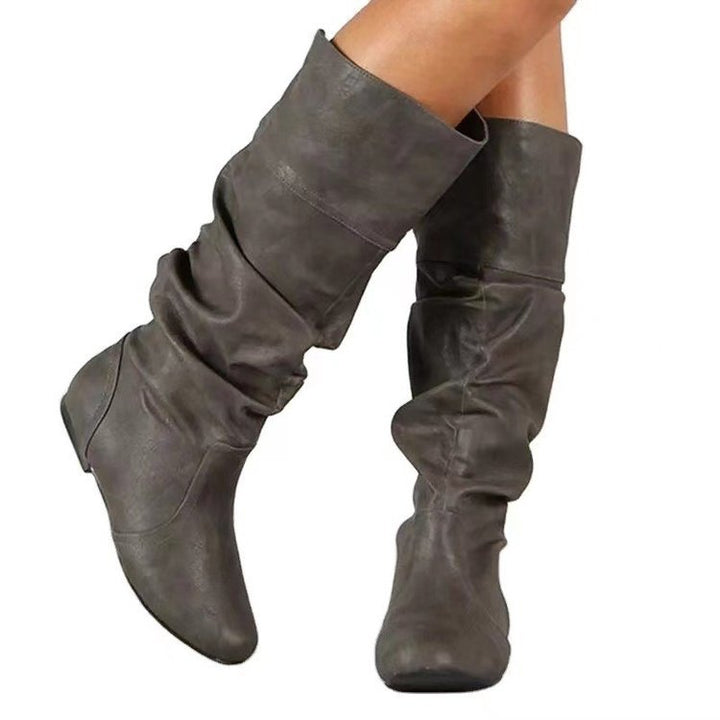 Damen Schlupfstiefel mit gerafftem Schaft und flacher Keilsohle Drune