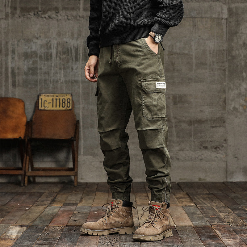 Herren Cargo-Jogginghose im urbanen Utility‑Stil mit elastischem Tunnelzugbund und verstärkten Kniepartien Drune