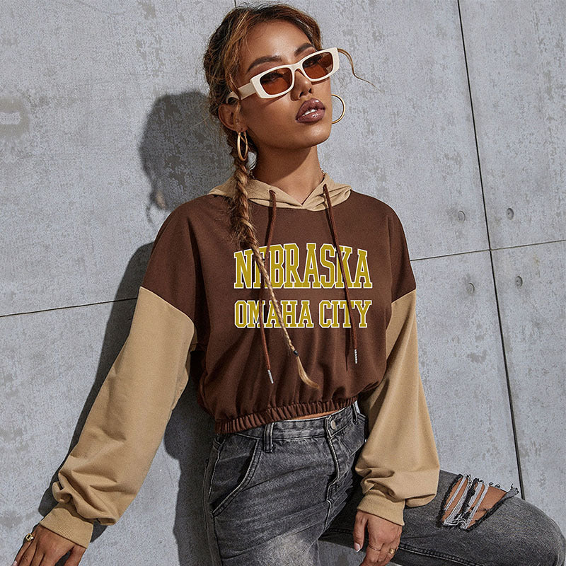 Damen Cropped Hoodie mit Kontrastärmeln, elastischem Saum und schmelzendem Smiley-Print Drune