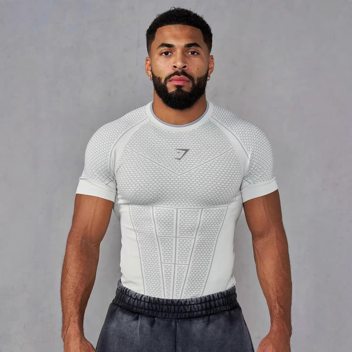Herren nan muskelmodellierendes Funktionsshirt mit 3D-Struktur und gezielten Kompressionszonen Drune