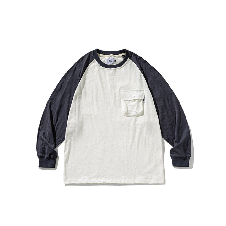 Unisex Lässiges Raglan-Longsleeve mit Kontrastärmeln und aufgesetzter Klappentasche Drune