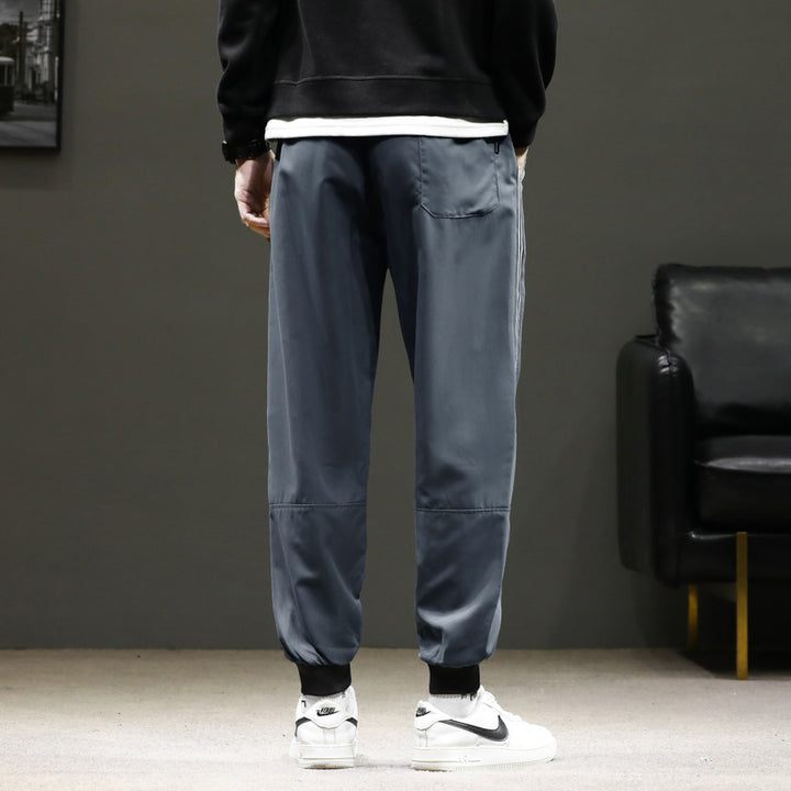 Herren Sportliche Nylon-Joggerhose mit elastischem Bund und seitlichen Kontraststreifen Drune