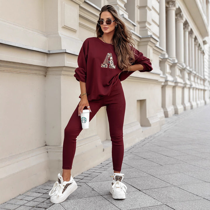 Damen lässiges Sweatshirt mit großem Initial und entspannter Passform Drune