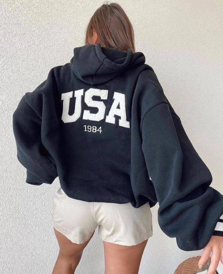 Damen Kurz geschnittener Oversize-Kapuzenpullover mit aufgenähter College-Applikation und gerippten Bündchen Drune