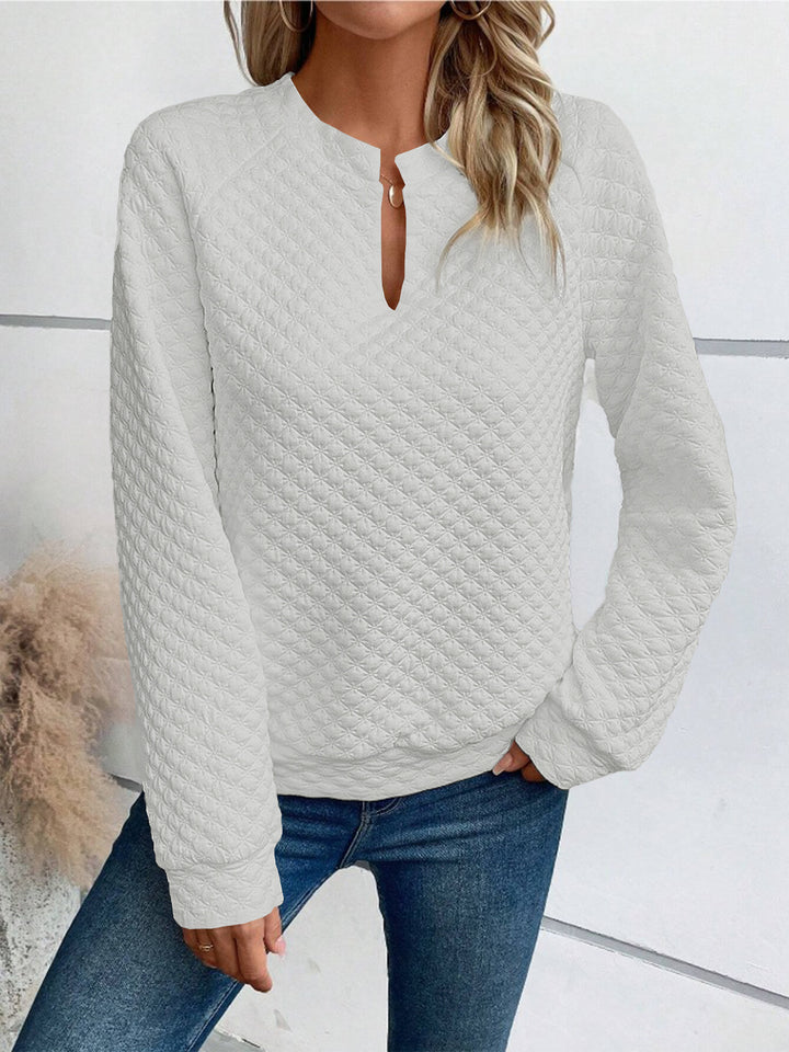 Damen Gestepptes Sweatshirt mit Schlitzkragen, Rautenstruktur und Raglanärmeln Drune