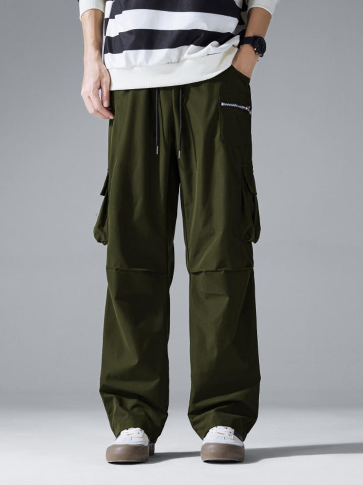 Herren Weite Cargo‑Hose im Baggy‑Cut mit Tunnelzugbund, Zipper‑Tasche & Klappfächern Drune