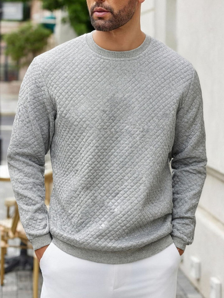 Herren gesteppter Sweatpullover mit Rautensteppung, geripptem Kragen und komfortablem Regular Fit Drune