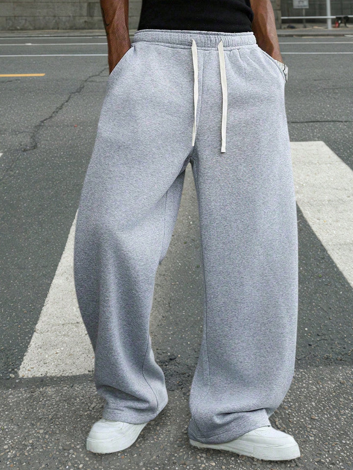 Herren Baggy-Jogginghose im Urban-Utility-Stil mit extra weitem Bein und sichtbarem Kordelzug Drune