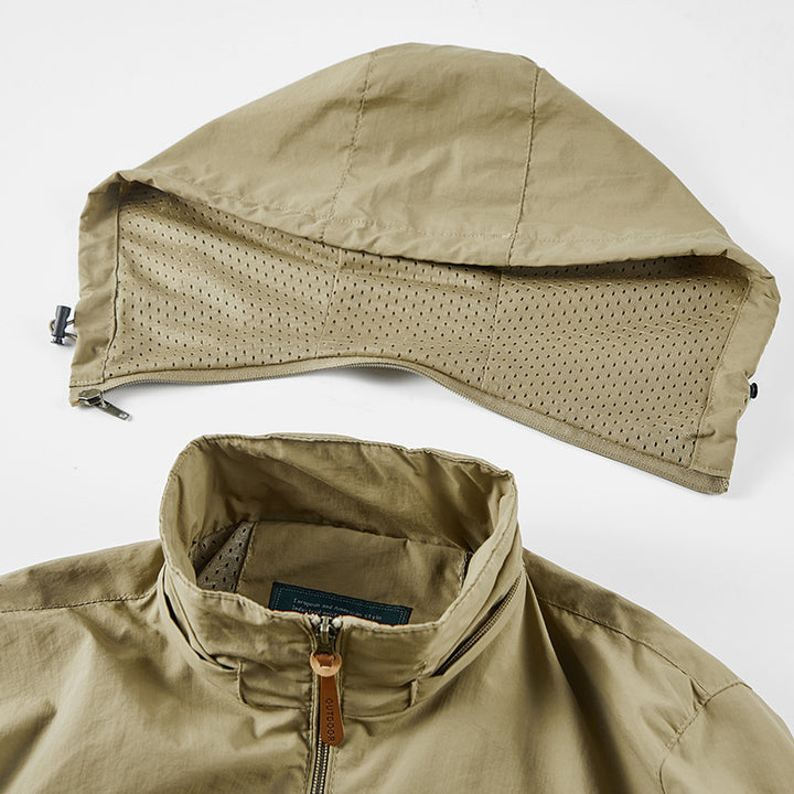 Unisex nan leichte wasserdichte Outdoorjacke mit Kapuze und wasserdichten Reißverschlusstaschen Drune
