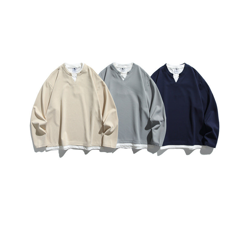 Unisex Oversize-Sweatshirt mit V‑Notch und integriertem Layer‑Look Drune