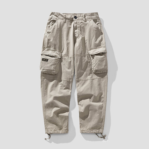 Herren Cargo‑Hose im Utility‑Workwear‑Stil mit großen Klappentaschen, Kniepaneelen und Kordelabschluss Drune