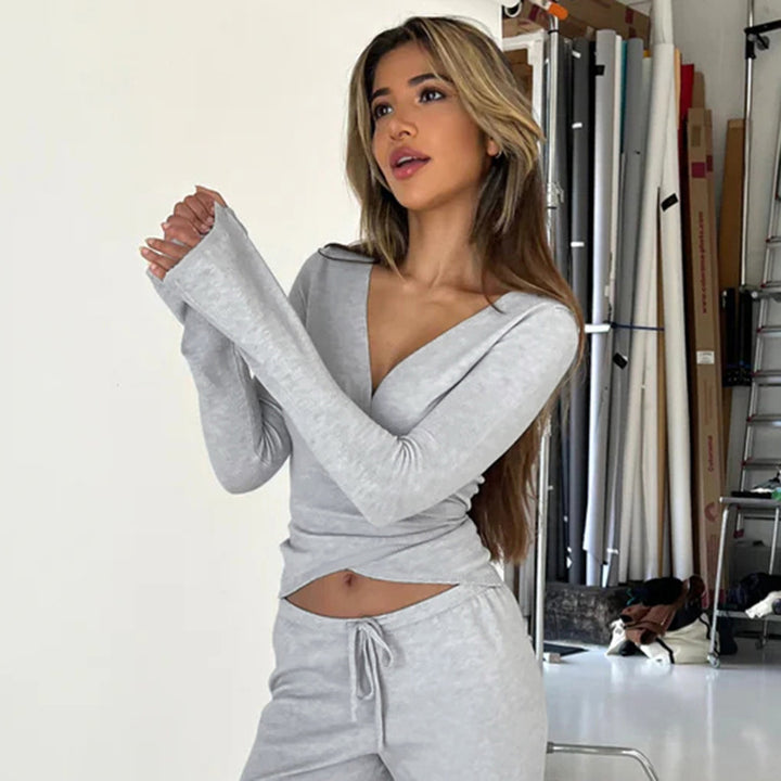 Damen nan Wickel-Cropped-Top mit tiefem V‑Ausschnitt, taillierter Wickelform und langen Glockenärmeln Drune