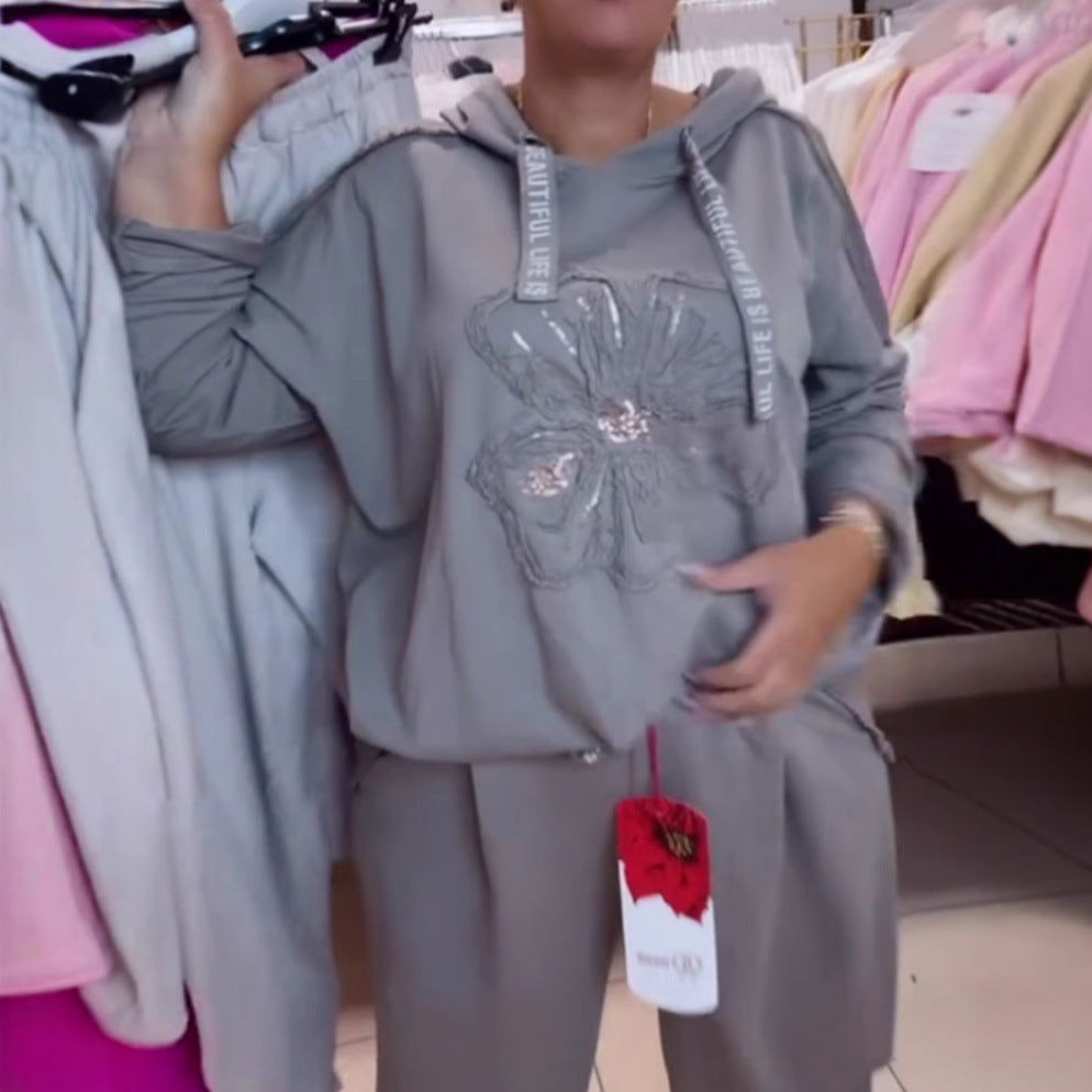 Damen nan entspanntes Lounge-Set mit Blüten-Pailletten-Hoodie, Kordelzug und weiter Bundfaltenhose Drune