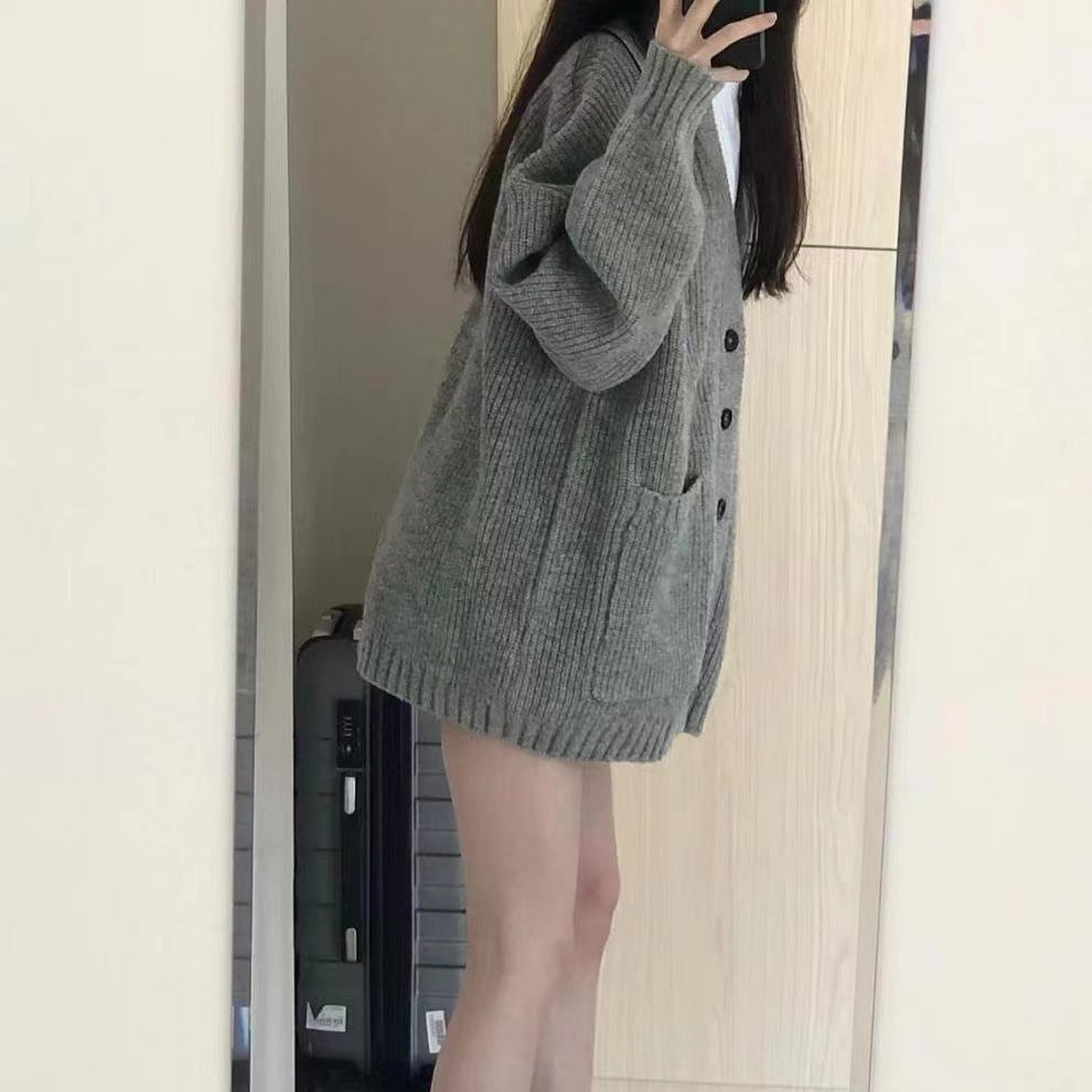 Damen oversized Strickjacke mit Knopfverschluss und praktischen Taschen Drune