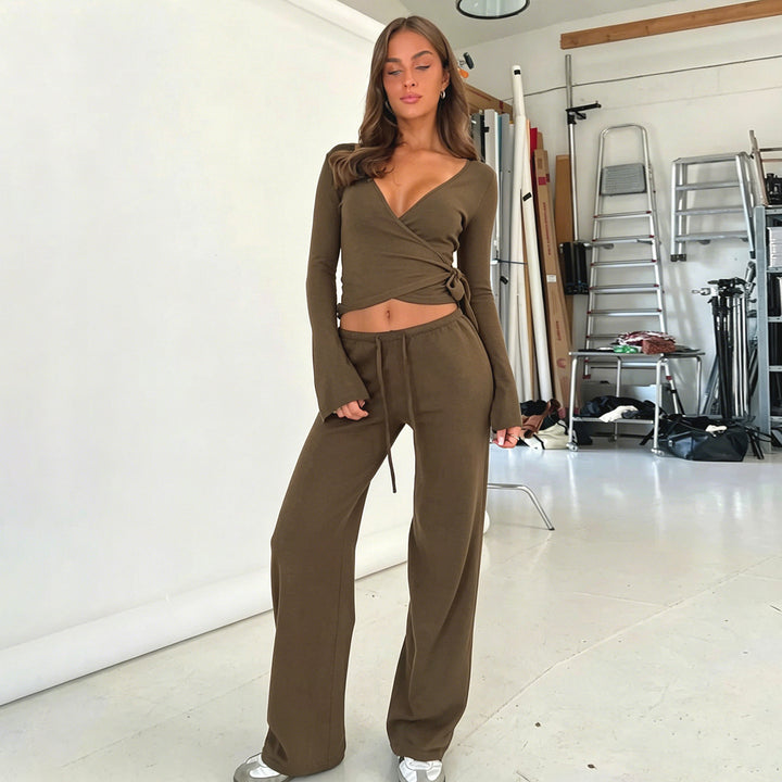 Damen nan Wickel-Cropped-Top mit tiefem V‑Ausschnitt, taillierter Wickelform und langen Glockenärmeln Drune