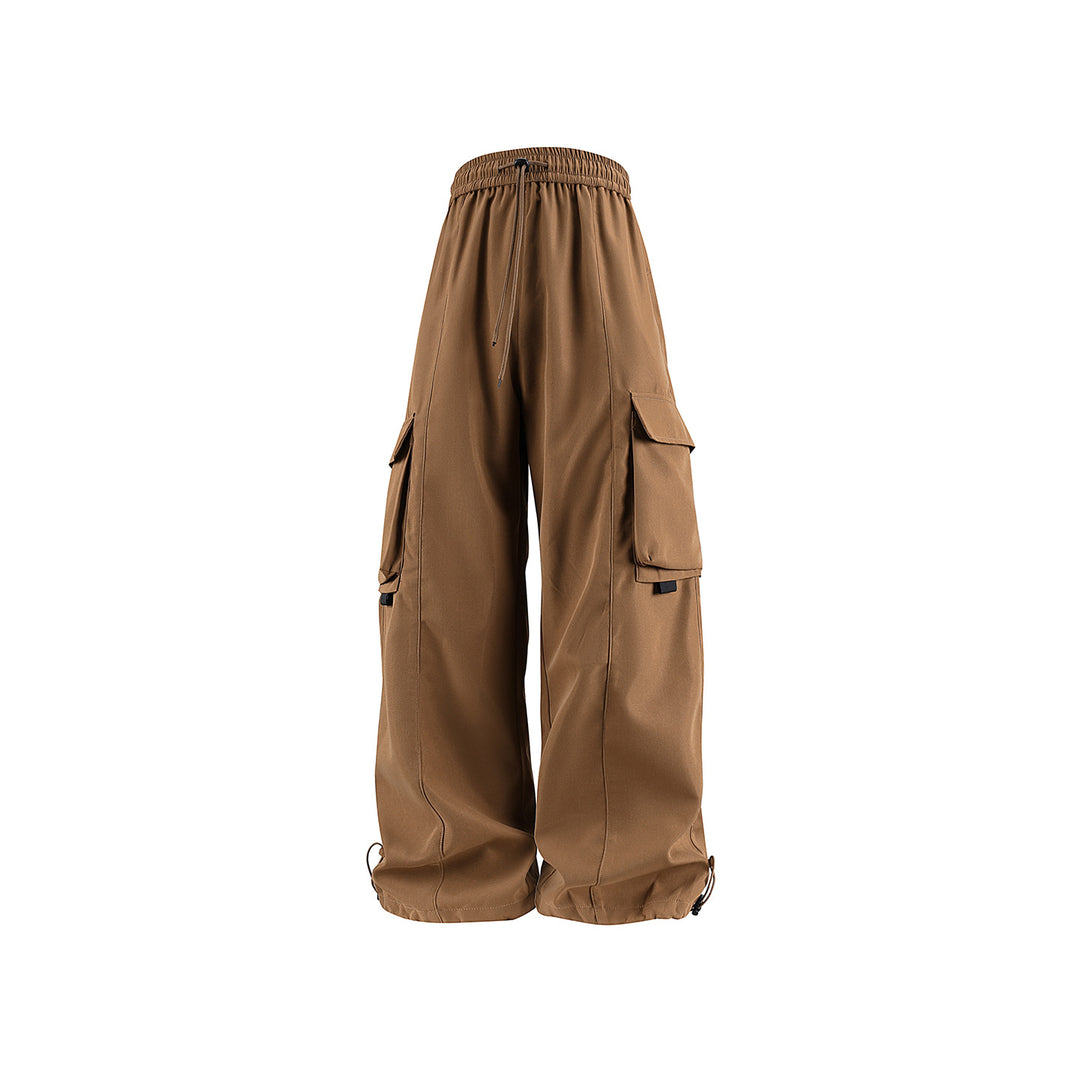 Herren weite Utility‑Cargohose im Baggy‑Cut mit Tunnelzugbund, großen Klappentaschen und verstellbarem Beinabschluss Drune