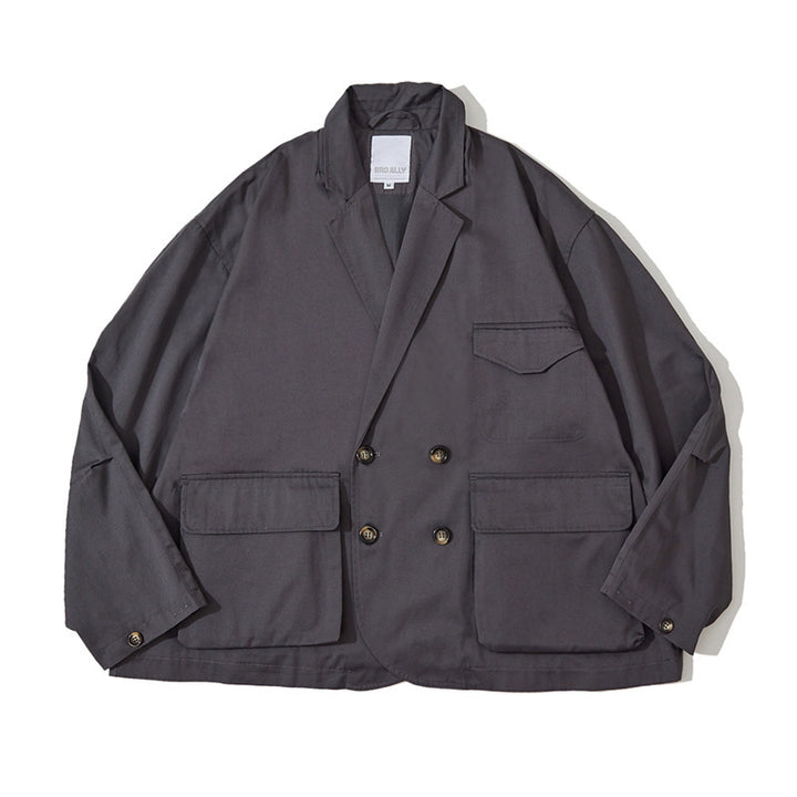Unisex Boxy-Überjacke mit doppelreihiger Knopfleiste, großen Utility-Pattentaschen und kurzem Boxy-Schnitt Drune
