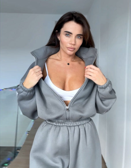 Damen lässiger Sportanzug mit oversized Kapuzenjacke und elastischen Hosen