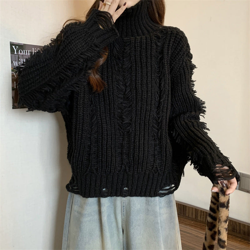Damen Grobstrickpullover mit hohem Kragen und modernen Fransen Drune
