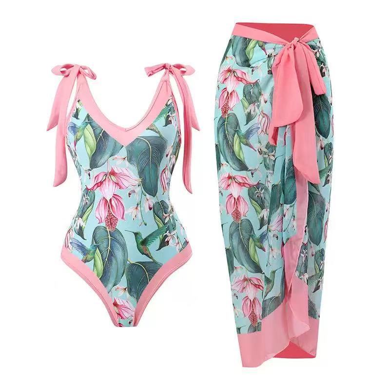 Damen Badeanzug mit floralem Design und transparentem Wickelrock Drune
