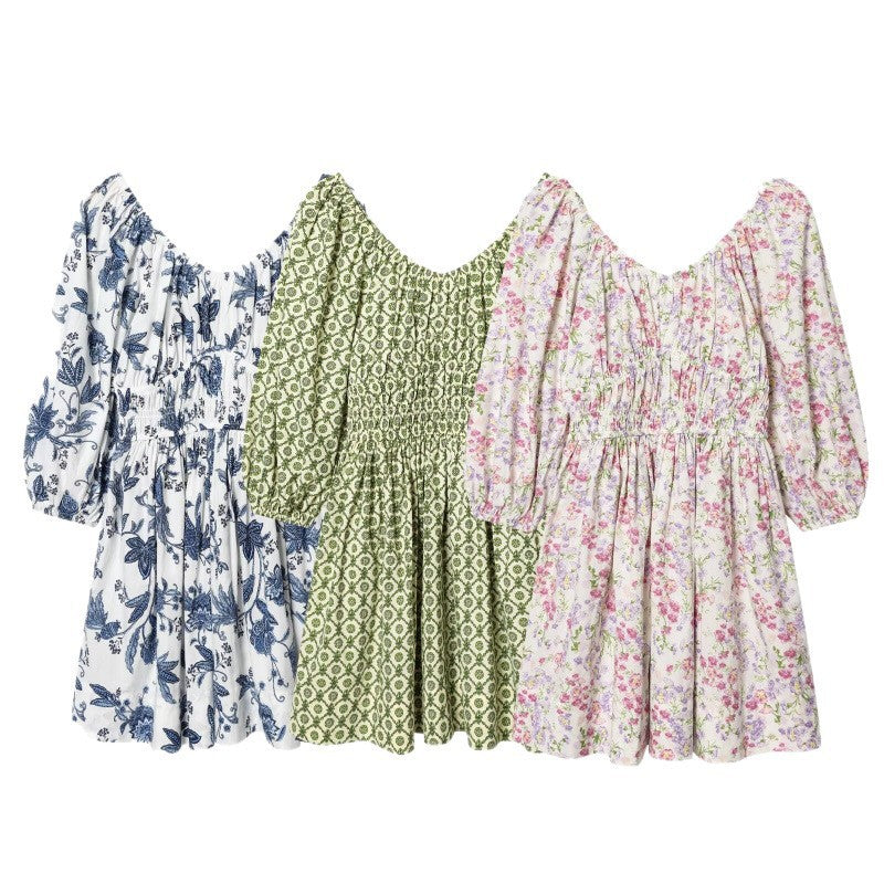 Damen Blumenkleid mit Smok-Taillierung und voluminösen Puffärmeln Drune