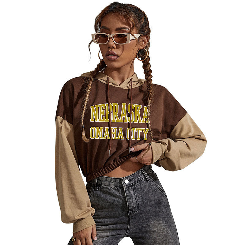 Damen Cropped Hoodie mit Kontrastärmeln, elastischem Saum und schmelzendem Smiley-Print Drune