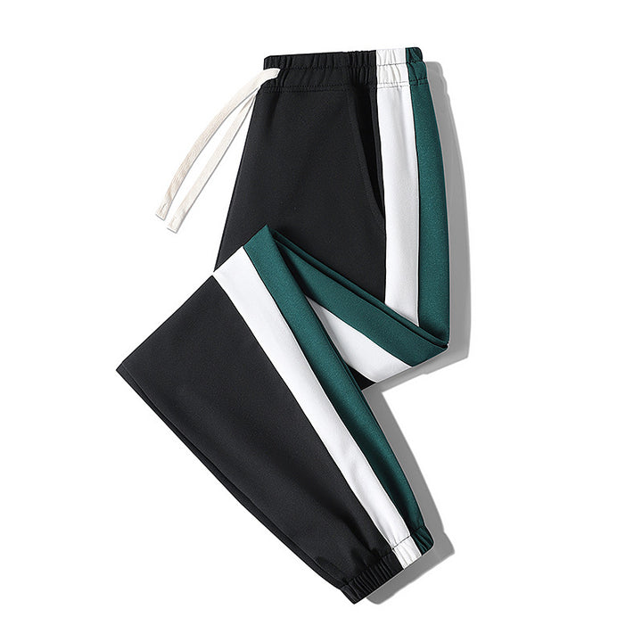 Herren Konische Trackhose mit Kordelzug, seitlichen Colorblock‑Streifen & elastischen Bündchen Drune