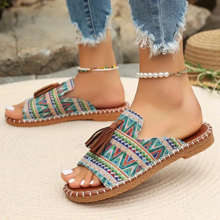 Damen Ethno-Slipper-Sandalen mit Quaste und handgenähter Ziernaht Drune