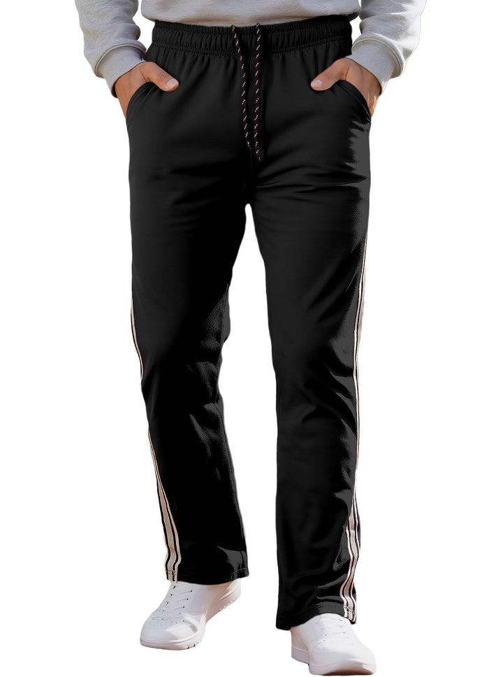 Herren nan Retro-Trackhose mit schmal zulaufendem Bein elastischem Bund Tunnelzug und seitlichen Streifen Drune