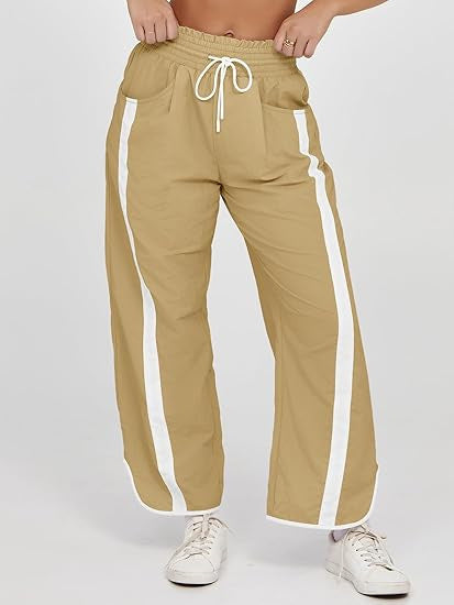 Damen nan relaxte Trackpants mit seitlichem Kontraststreifen, elastischem Smokbund und Eingrifftaschen Drune