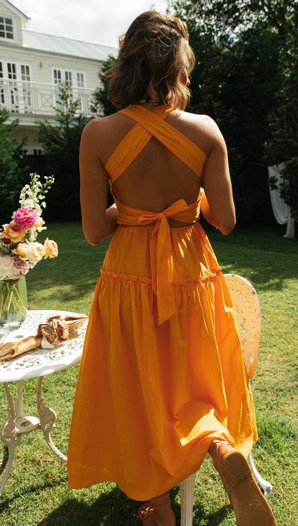 Damen Maxikleid mit tieferem Rückenausschnitt und seitlichen Schleifen Drune