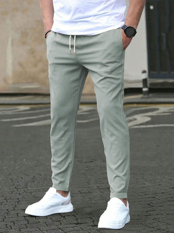 Herren Slim-Fit Jogginghose mit Kordelzug, Seitentaschen und schmalem Knöchelabschluss Drune