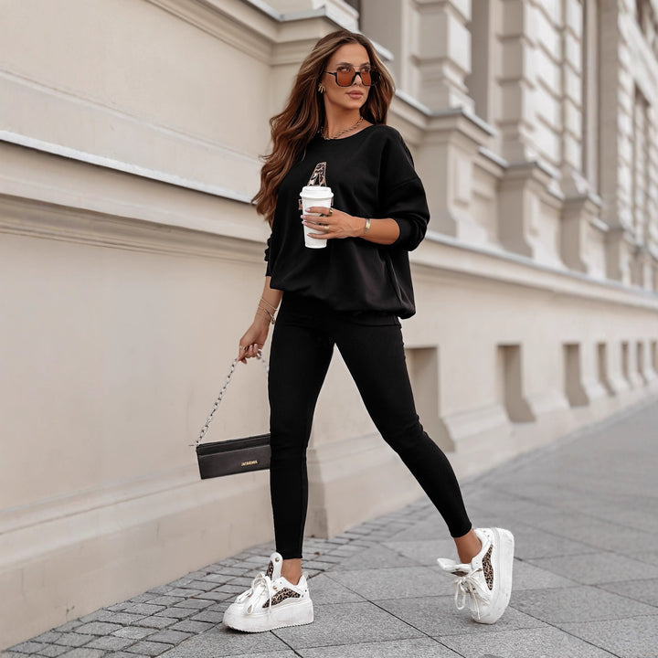Damen lässiges Sweatshirt mit großem Initial und entspannter Passform Drune