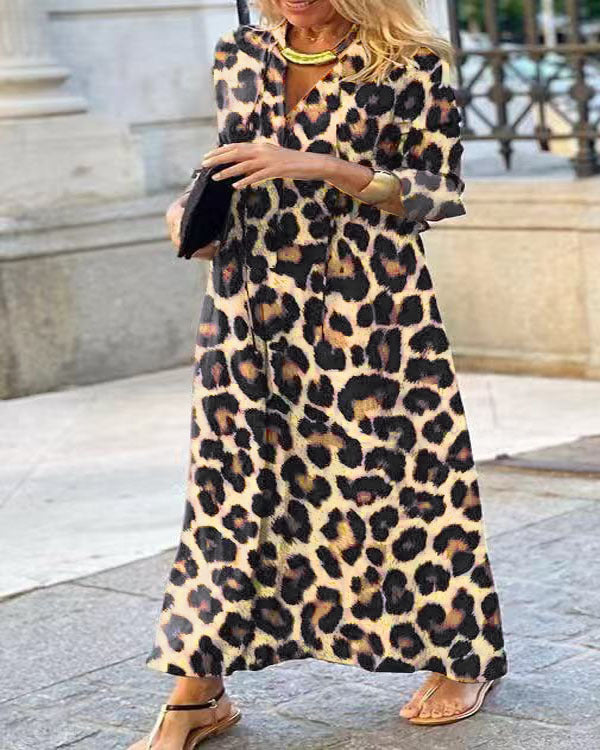 Damen Maxi-Kleid im Leoprint mit V-Ausschnitt, dreiviertelärmeln und weiter A‑Linie Drune