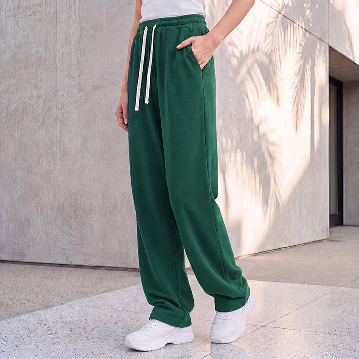 Damen nan weite Loungepalazzo-Hose mit hohem Komfortbund, Kordelzug, seitlichen Eingrifftaschen und dekorativer Seitennaht Drune