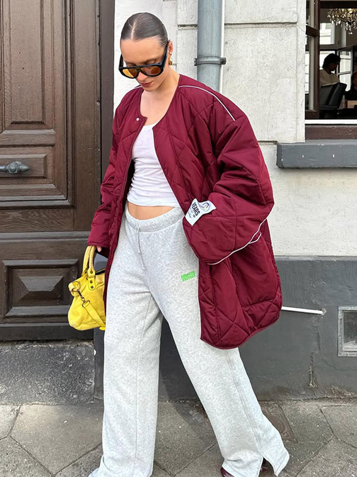 Damen Oversize-Steppjacke mit Diamantstepp, kontrastierender Paspel und Druckknopfverschluss Drune