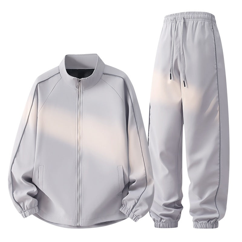 Unisex Tech-Trackset aus ultraleichtem Ripstop mit Stehkragen, Meshfutter & Kordelzughose Drune
