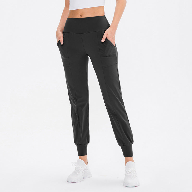 Damen elastische Sporthose mit praktischen Seitentaschen und temperaturregulierendem Material Drune