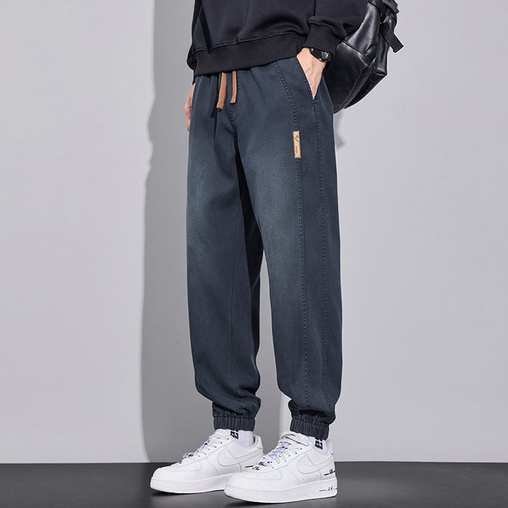 Herren Relaxed-Fit Jogginghose im Denim‑Look mit elastischem Bund, Tunnelzug und geripptem Beinabschluss Drune