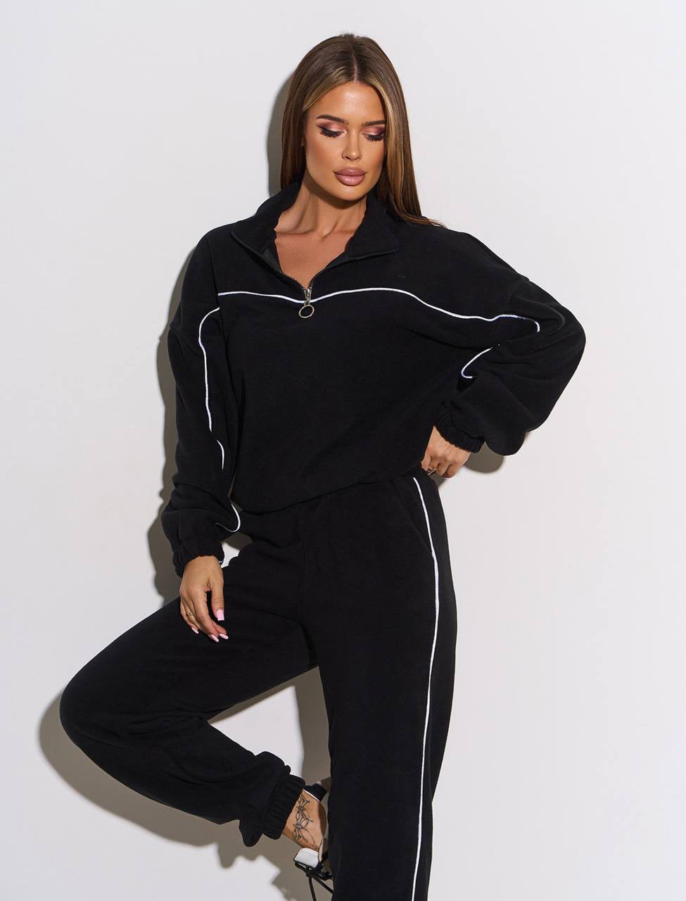 Damen Fleece-Sportanzug mit hohem Kragen und praktischen Reißverschlussdetails Drune