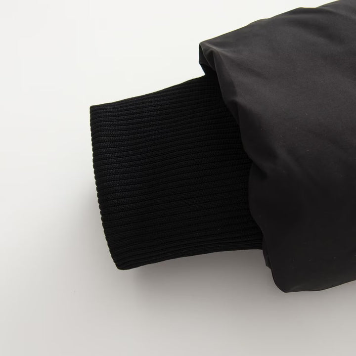 Damen kurze gesteppte Steppjacke mit taillierter Korsettschnitt‑Silhouette und hohem Stehkragen Drune