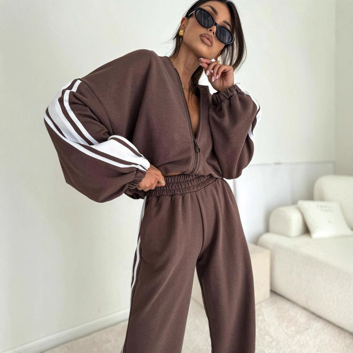 Damen cropped Zip-Hoodie mit voluminösen Ballonärmeln und High-Waist Relaxhose im sportlichen Seitenstreifen-Design Drune