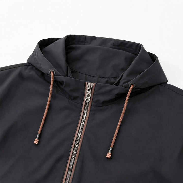 Herren Leichte Softshell‑Hoodiejacke mit wasserabweisender Außenlage, Lederapplikationen und Reißverschlusstaschen Drune