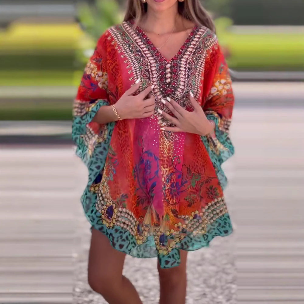 Damen Strandkleid im farbenfrohen Boho-Stil mit verspieltem Design und tiefem V-Ausschnitt Drune