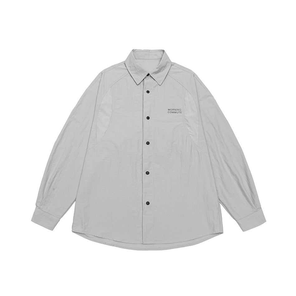 Unisex Lockeres Coach-Shirtjacke mit Kentkragen, Druckknopfleiste und minimalem Brustprint Drune