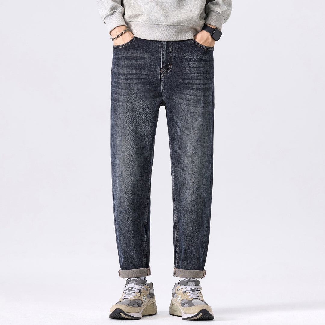 Herren konisch geschnittene Denimhose mit mittlerer Leibhöhe, relaxed Fit und dezenter Used-Optik Drune