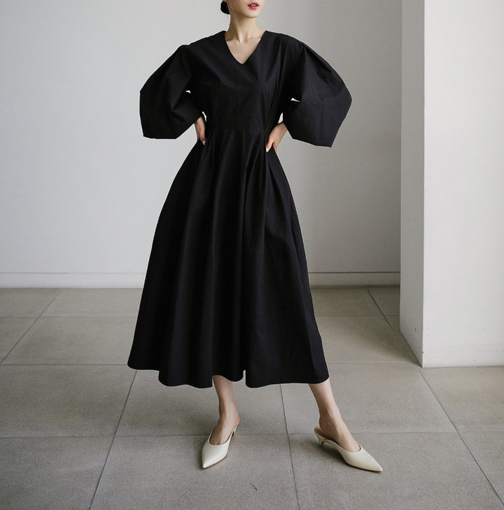 Damen Maxikleid mit weiten Ballonärmeln und seitlichen Eingrifftaschen Drune