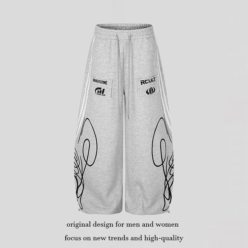 Damen Weite Midilounge‑Sweathose im Palazzo‑Cut mit Tunnelzug, Zip‑Saum und Statement‑Print Drune